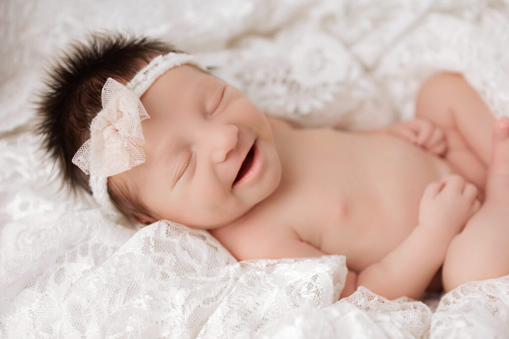 top five questions to ask a newborn photographer before booking a session