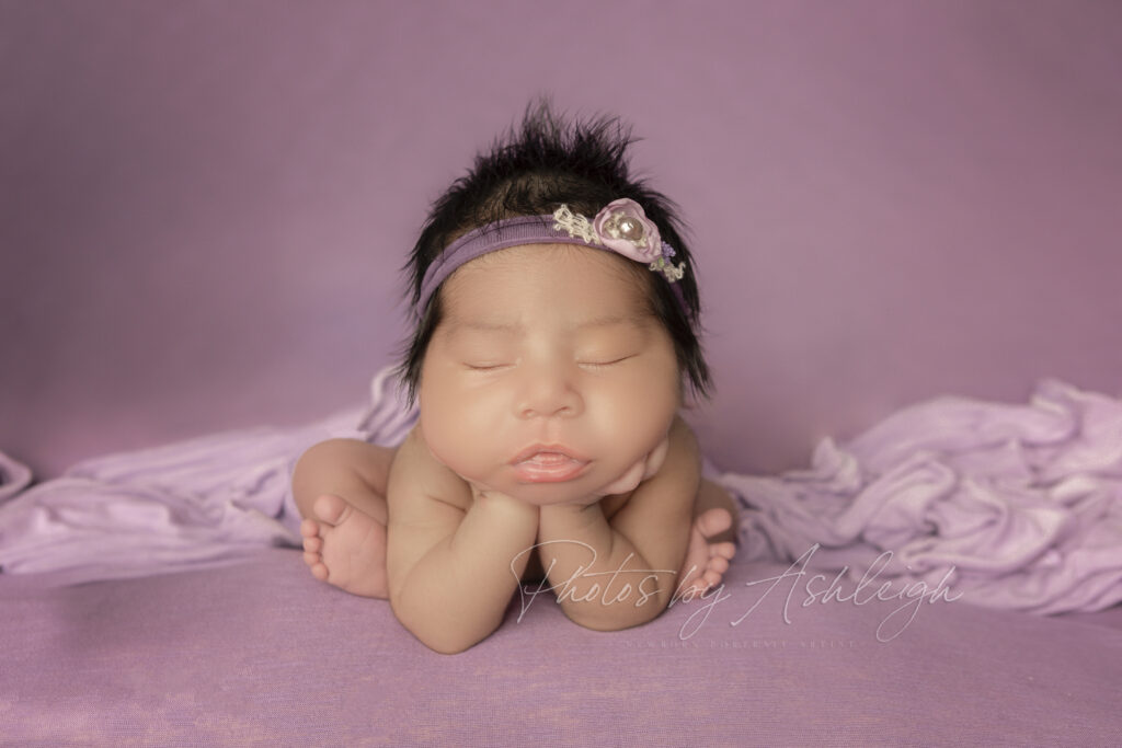 newborn baby  girl in froggy pose