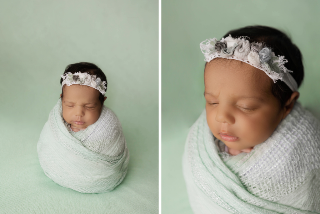 newborn baby girl posed on green backdrop with dainty floral headband